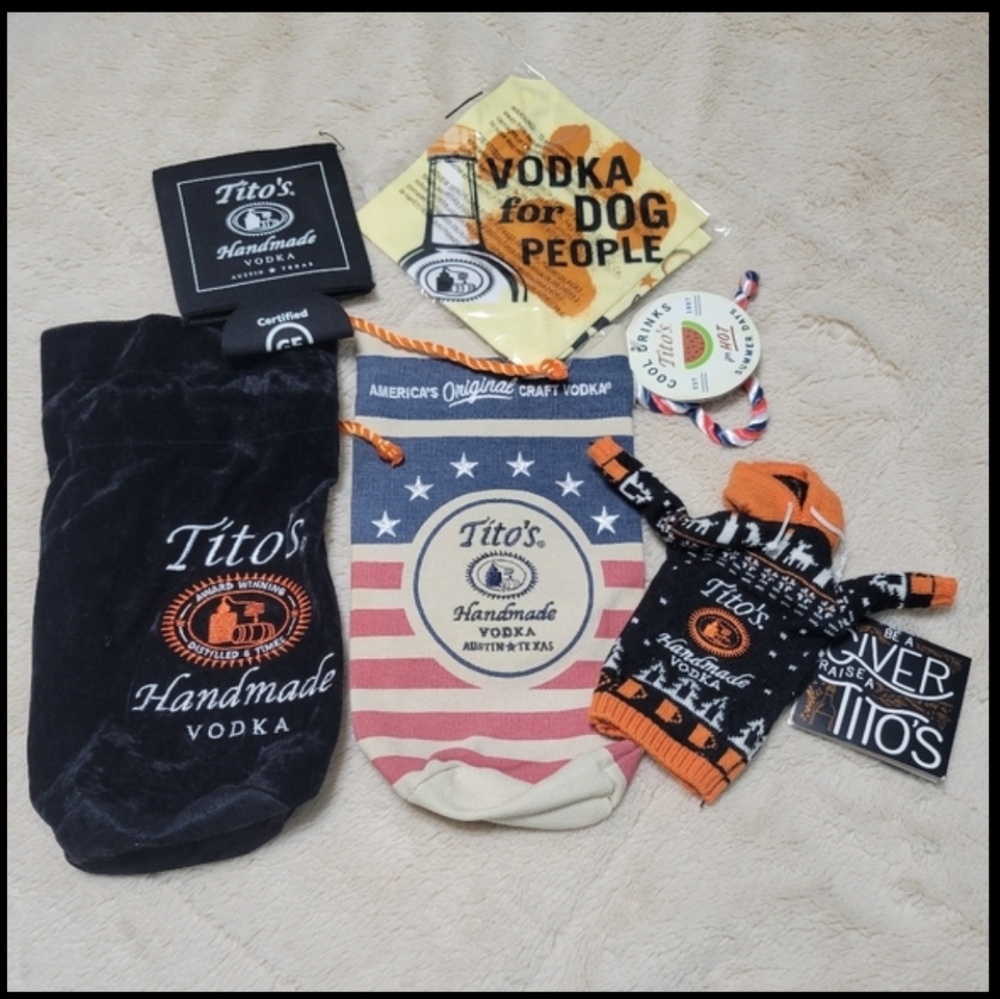 Assortment of Tito’s Swag- drawstring bag, bottle sweater, doggie bandana & more